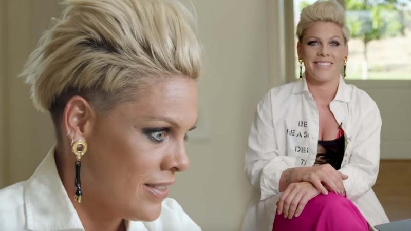 Pink watches back her old music videos and her reactions are priceless