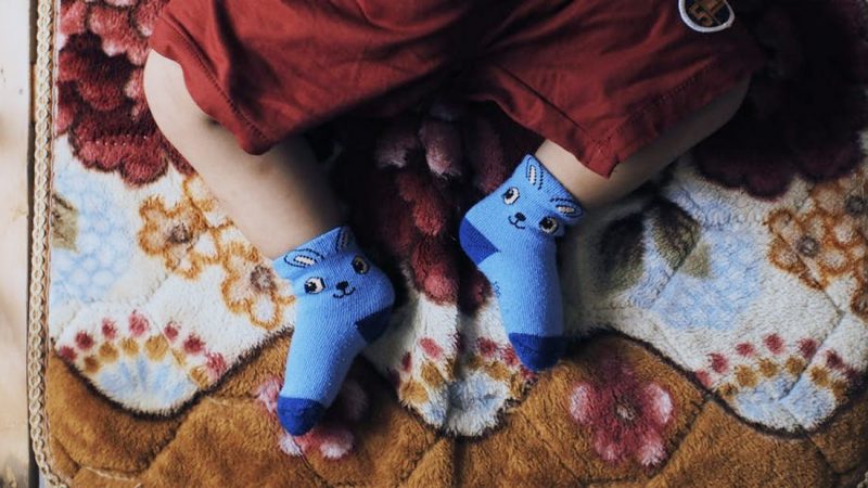 Mum surprised by daycare 'hack' to keep socks on babies
